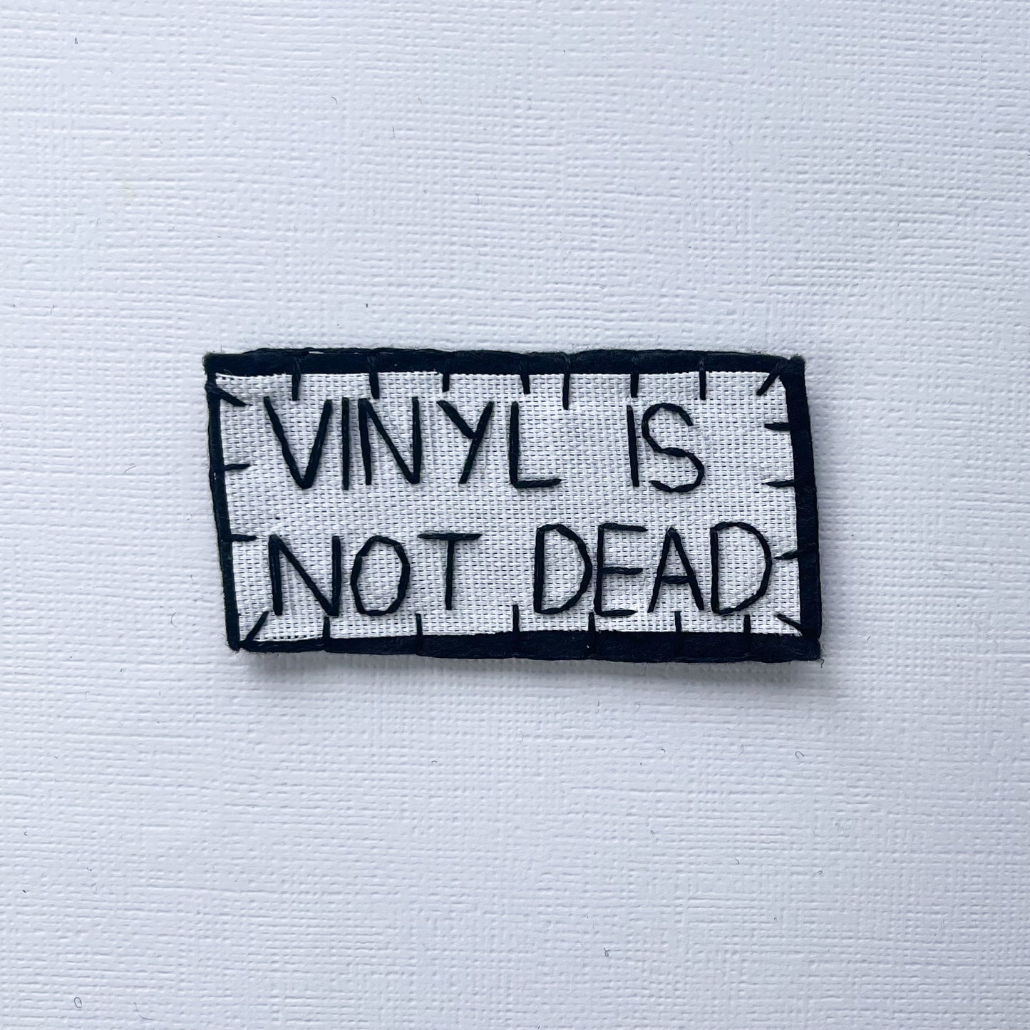 Vinyl Is Not Dead Hand White Background Embroidered Patch